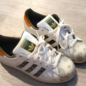 Adidas green stripe shoe